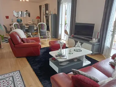 Coin salon dans l'établissement Chambre privative avec salle d'eau