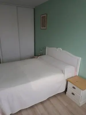 Un ou plusieurs lits dans un hébergement de l'établissement L'Intemporel - Appartement T3 avec jardinet