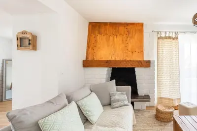 Coin salon dans l'établissement Maison de vacance à 15 minutes de Royan
