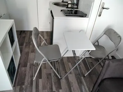 Cuisine ou kitchenette dans l'établissement Studio indépendant