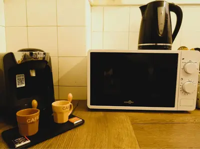 Cuisine ou kitchenette dans l'établissement Appartement lumineux avec vue - Centre & gare