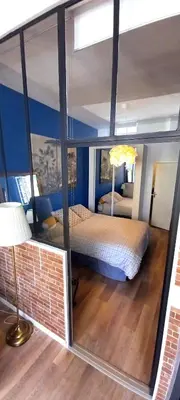 Un ou plusieurs lits dans un hébergement de l'établissement LA ROCHELAISE : Appartement calme & somptueux dans l'hyper centre.