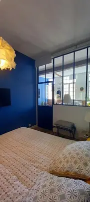 Un ou plusieurs lits dans un hébergement de l'établissement LA ROCHELAISE : Appartement calme & somptueux dans l'hyper centre.