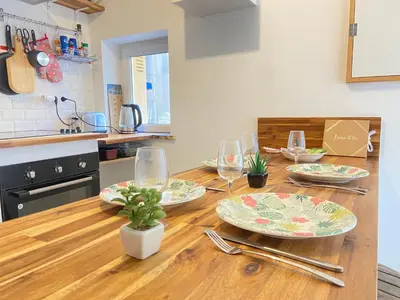 Cuisine ou kitchenette dans l'établissement - Le Lys - Magnifique maisonnette avec terrasse