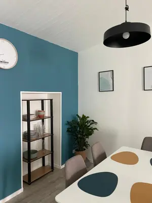 Un ou plusieurs lits dans un hébergement de l'établissement L'escapade de Rompsay Cosy & Moderne