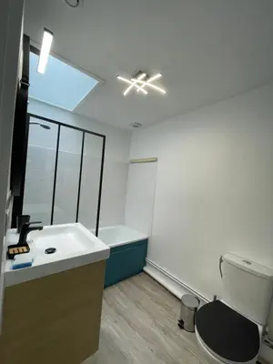 Télévision ou salle de divertissement dans l'établissement L'escapade de Rompsay Cosy & Moderne