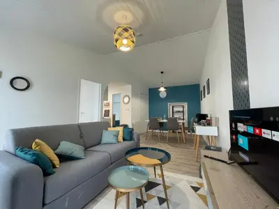 Coin salon dans l'établissement L'escapade de Rompsay Cosy & Moderne