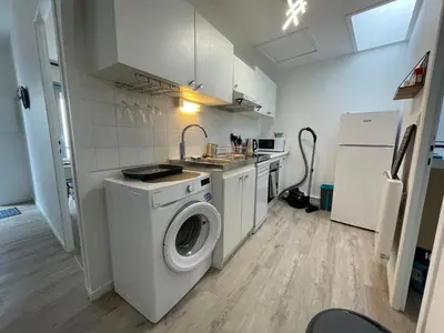 Cuisine ou kitchenette dans l'établissement L'escapade de Rompsay Cosy & Moderne