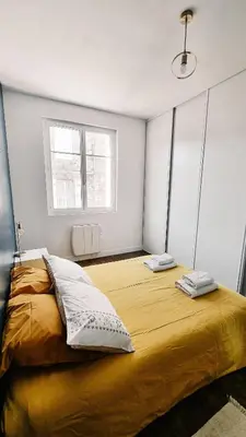 Un ou plusieurs lits dans un hébergement de l'établissement Balcon du Champ de Mars - #Parking #Air Conditioner #Clim