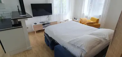 Télévision ou salle de divertissement dans l'établissement Studio Zen