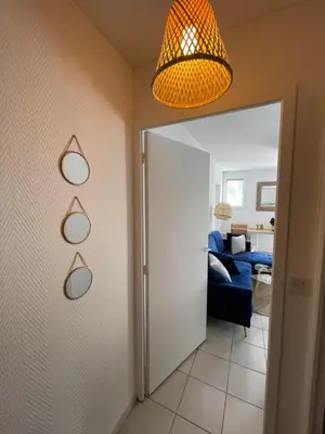 Un ou plusieurs lits dans un hébergement de l'établissement 2 pièces avec parking en Coeur de Ville - Appartement lumineux et calme