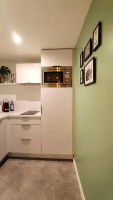Cuisine ou kitchenette dans l'établissement Votre Escale Jungle Sauna & Spa