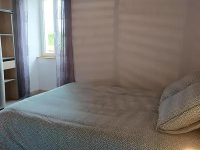 Un ou plusieurs lits dans un hébergement de l'établissement Maison au calme avec grand jardin et tout confort en Charente Limousine - FR-1-653-133