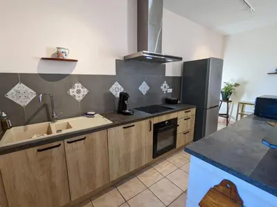 Cuisine ou kitchenette dans l'établissement Gîte de charme près de Cognac avec vélos et jardin - FR-1-653-205