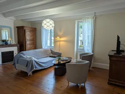Un ou plusieurs lits dans un hébergement de l'établissement Gîte XVIIIe rénové avec grand jardin, au cœur du vignoble de Cognac - FR-1-653-30