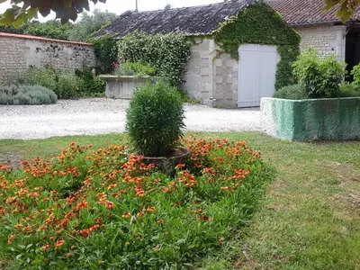 Jardin de l'établissement Gîte XVIIIe rénové avec grand jardin, au cœur du vignoble de Cognac - FR-1-653-30