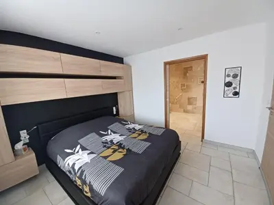 Un ou plusieurs lits dans un hébergement de l'établissement La Grange 3 étoiles - Maison d'hôte à 10 min des plages