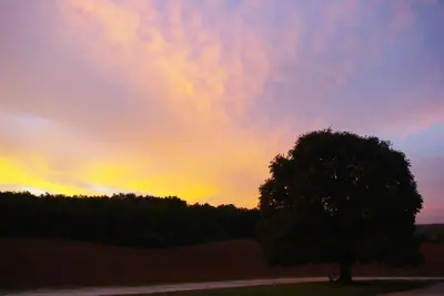 Lever ou coucher de soleil vu de la maison de vacances ou à proximité