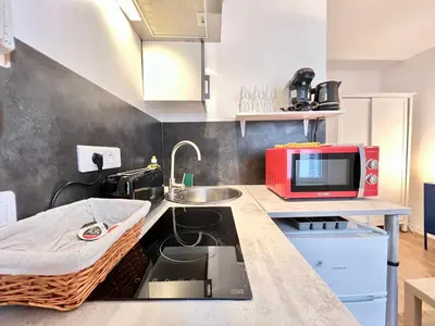 Cuisine ou kitchenette dans l'établissement Le Michigan, studio à 5 min du centre-ville