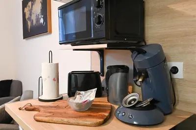 Cuisine ou kitchenette dans l'établissement L'Albizia #Hyper-centre #Marché couvert