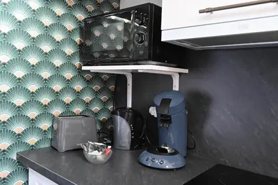 Cuisine ou kitchenette dans l'établissement L'orchidée #Hyper-centre #Marché couvert