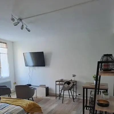 Télévision ou salle de divertissement dans l'établissement Studio de charme