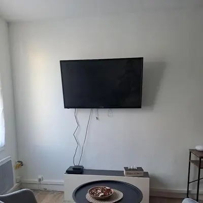 Télévision ou salle de divertissement dans l'établissement Studio de charme