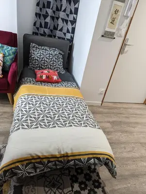 Un ou plusieurs lits dans un hébergement de l'établissement Beau-Jean, Un Cocon Sympa 5 min à Pied du Centre-Ville, Parking Privé, à 10 min du CHU