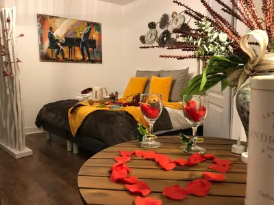 Coin salon dans l'établissement LES APPART'S DES DEMOISELLES DE ROCHEFORT