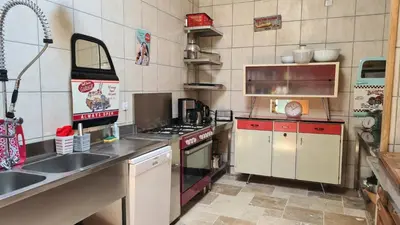 Cuisine ou kitchenette dans l'établissement La Ferme des Augustines
