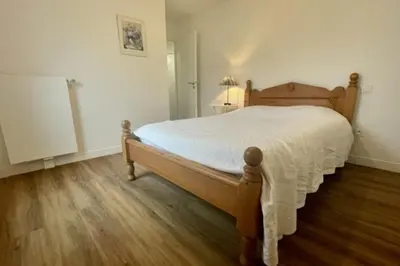 Un ou plusieurs lits dans un hébergement de l'établissement Nice 66m with terrace in La Rochelle