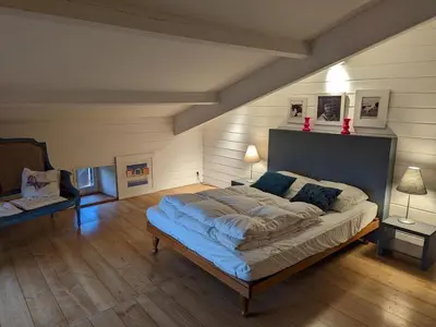 Un ou plusieurs lits dans un hébergement de l'établissement Gîte authentique avec cheminée, terrasse et WiFi en Charente - FR-1-653-119