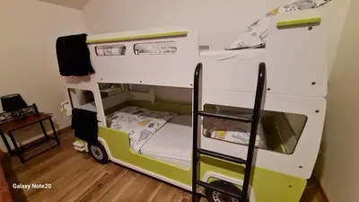 Un ou plusieurs lits dans un hébergement de l'établissement La Thibaudière Gite 70m2