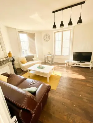 Coin salon dans l'établissement Le Repos Poitevin Studio Atypique