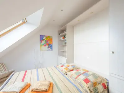 Un ou plusieurs lits dans un hébergement de l'établissement Duplex 4 pièces, balcon, 6 pers, Châtelaillon-Plage, Wi-Fi - FR-1-258-204