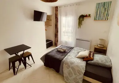 Un ou plusieurs lits dans un hébergement de l'établissement Studio chaleureux - Parking facile - 5min d'Angoulême