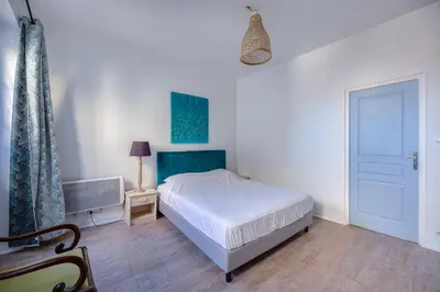 Un ou plusieurs lits dans un hébergement de l'établissement MYAPPARTLAROCHELLE