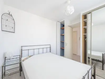 Un ou plusieurs lits dans un hébergement de l'établissement Appartement 4 Pers. Terrasse Clim, Piscine Collective - FR-1-258-203