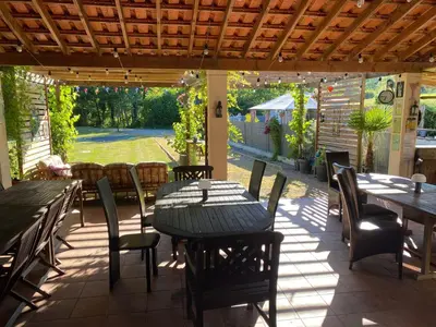 Jardin de l'établissement Camping Moulin du Pommier