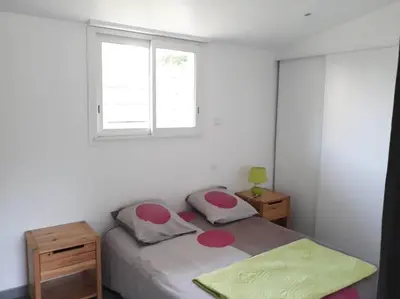 Un ou plusieurs lits dans un hébergement de l'établissement Maison de 4 personnes