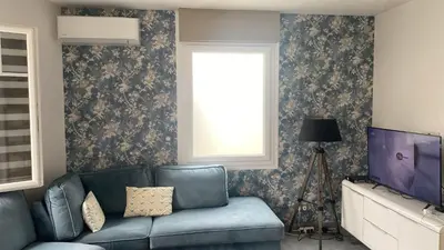 Télévision ou salle de divertissement dans l'établissement Pavillon 50 m² avec terrasse