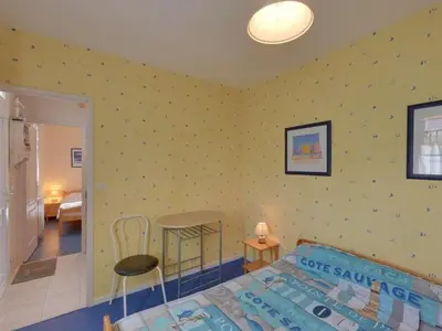 Un ou plusieurs lits dans un hébergement de l'établissement Maison paisible près de la plage, 5 pers, jardin, animaux bienvenus - FR-1-706-7