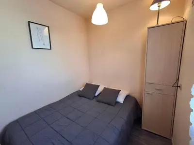 Un ou plusieurs lits dans un hébergement de l'établissement Studio proche plage à Châtelaillon avec terrasse et parking - Animaux admis - FR-1-706-9