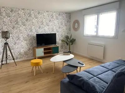 Télévision ou salle de divertissement dans l'établissement L'échappée Belle