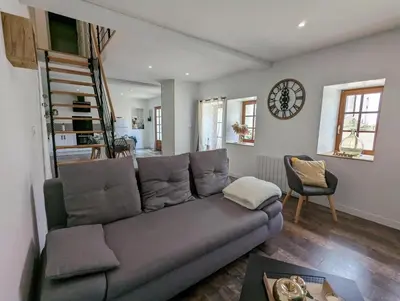Coin salon dans l'établissement Gîte La Rive Gauche