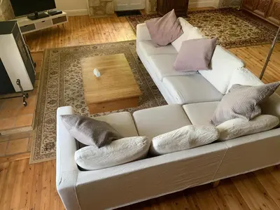 Coin salon dans l'établissement Maison des Roses