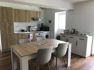 Cuisine ou kitchenette dans l'établissement Gîte Au Petit Bonheur