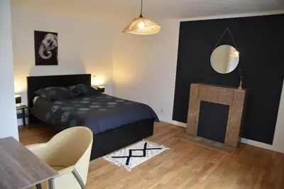 Un ou plusieurs lits dans un hébergement de l'établissement [Le 8] Maison de ville élégante et tout confort