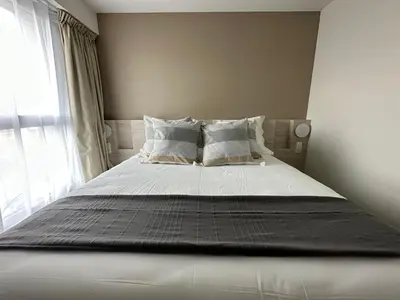 Un ou plusieurs lits dans un hébergement de l'établissement Hôtel Akena Chauray-Niort