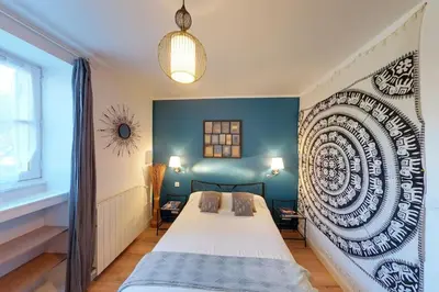 Un ou plusieurs lits dans un hébergement de l'établissement Villa 4* vue mer piscine spa